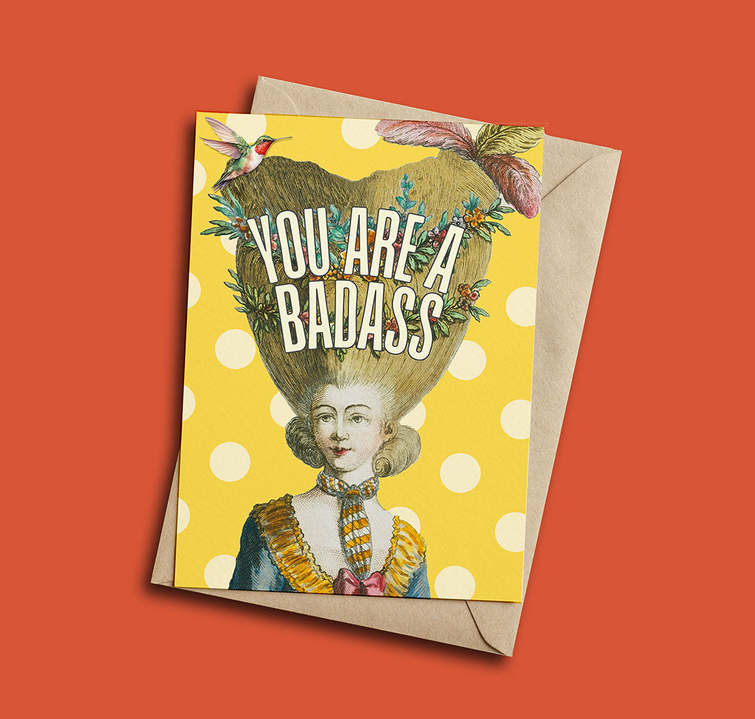 Greeting card with vintage-style illustration and 'You Are a Badass' text on a polka dot background.